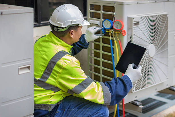 Professional Heat Pump Repair technician working in Signal Hill, CA